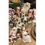 A collection of ten Staffordshire Spaniel figures,