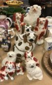 A collection of ten Staffordshire Spaniel figures,