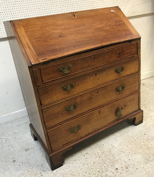 An 18th Century walnut bureau,