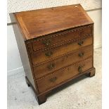 An 18th Century walnut bureau,