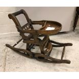 A Victorian stained beech metamorphic highchair of typical form,