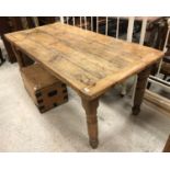 A Victorian pine farmhouse style kitchen table, the plank top with cleated ends,
