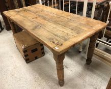 A Victorian pine farmhouse style kitchen table, the plank top with cleated ends,