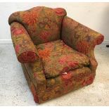 A Sinclair Melsom Designs Ltd scroll arm chair in floral print upholstery raised on square tapered