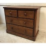 A Victorian mahogany chest of two short over two long drawers with turned knob handles 106 cm wide