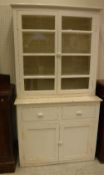 An early 20th Century painted pine kitchen cabinet,