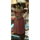 A Royal Worcester candle snuffer as a singing bird headed woman "Diffidence",