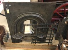 A 19th Century cast iron bedroom fireplace with integral kettle stands, 96.