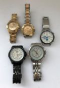Two Rolex-style wristwatches together with Two Breitling-style wristwatches and a Tag-style