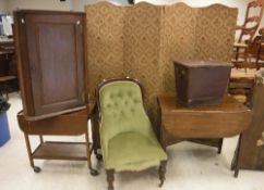 A George III oak and inlaid hanging corner cupboard of typical form,