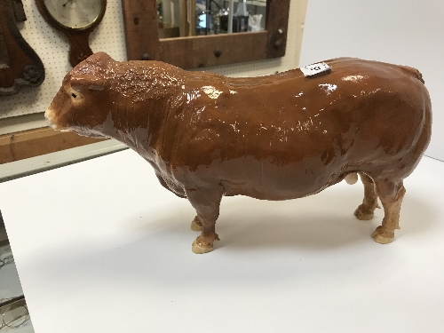 An Isle of Man pottery figure of a bull inscribed to base "Shebeg I.O.M. A. - Image 2 of 23