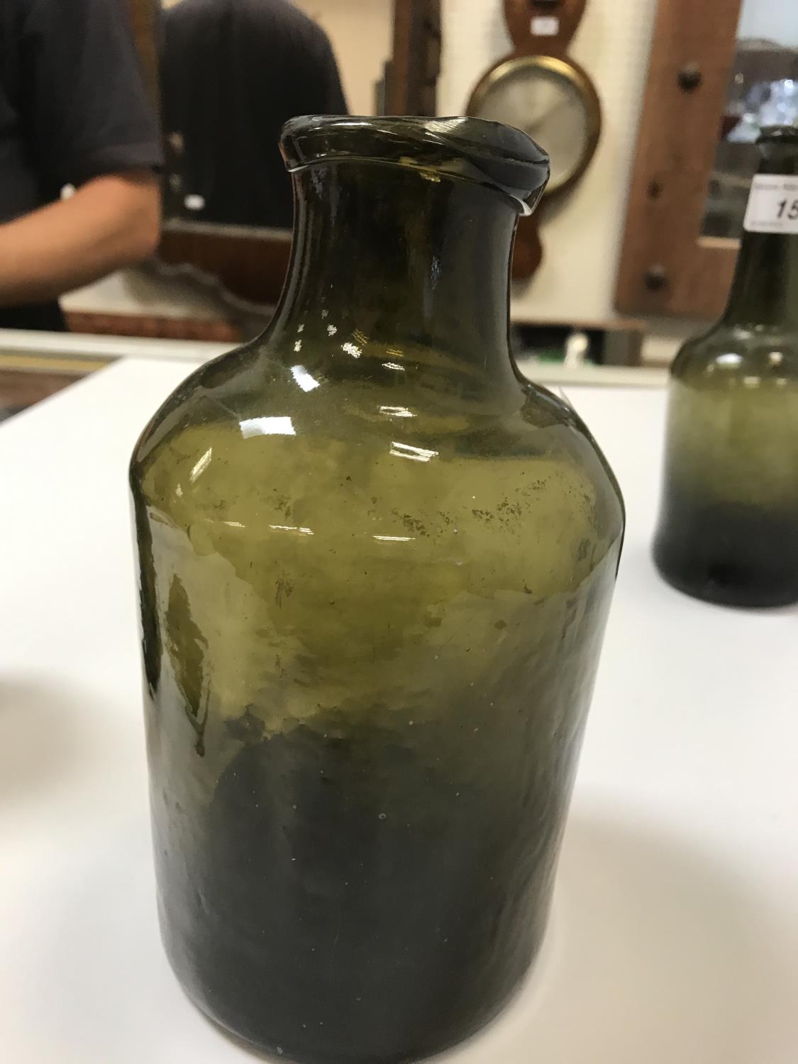 A selection of three 19th Century green glass bottles, the tallest approx 21. - Image 11 of 22