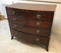 A 19th Century mahogany bow fronted chest of four long graduated drawers on splayed bracket feet 99