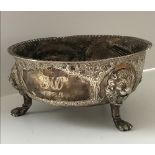 A George V silver bowl with embossed decoration depicting fox,