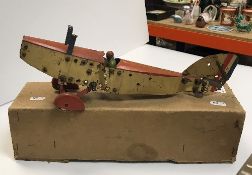 A Meccano tinplate bi-plane in RAF colours (poor condition) together with a Kleeware Martin Bomber