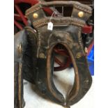 A 19th Century French leather heavy horse collar with brass decoration,