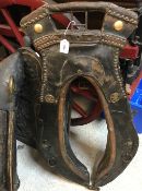 A 19th Century French leather heavy horse collar with brass decoration,