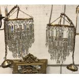 A pair of modern ceiling lights with cut glass lustres
