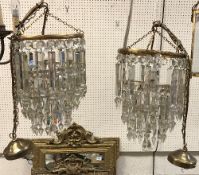 A pair of modern ceiling lights with cut glass lustres