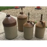 A collection of four stone cider flagons mounted as table lamps