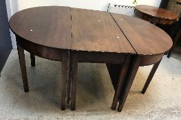 An early 19th Century mahogany D end dining table,