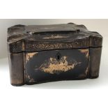 A 19th Century black lacquered and chinoiserie decorated tea caddy of shaped rectangular form,