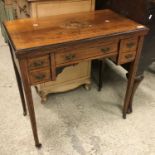 A circa 1900 rosewood and marquetry inlaid fold over card table,