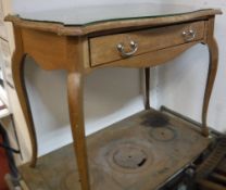 A Continental pale mahogany writing table,