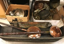 A box of assorted copper and brass ware to include two copper warming pans, brass skimmer,