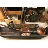 A box of assorted copper and brass ware to include two copper warming pans, brass skimmer,