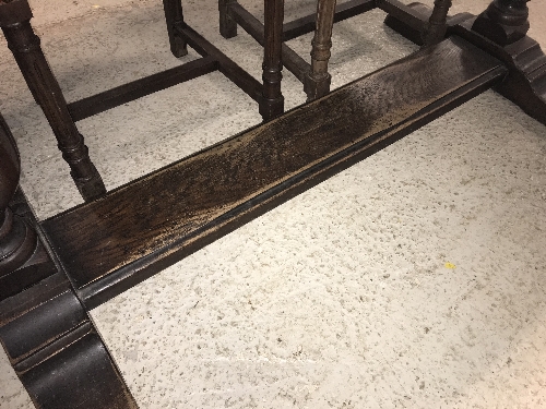 An oak draw leaf dining table in the 16th Century style, the plain top with cleated ends, - Image 12 of 16