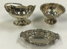 A late Victorian silver pedestal bowl with embossed acanthus and scrolling decoration and pie crust