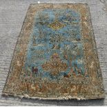 A Tree of Life style Persian rug decorated with foliage, birds,
