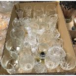 A collection of glassware to include cut glass trumpet shaped vase, a further cut glass vase,