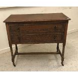 An Edwardian mahogany and inlaid dressing chest with mirrored superstructure above two drawers on