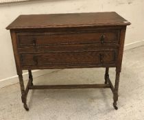 An Edwardian mahogany and inlaid dressing chest with mirrored superstructure above two drawers on