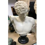 A modern Italian composition faux marble bust of Hermes, raised on a black composition socle,