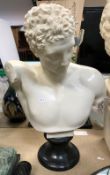 A modern Italian composition faux marble bust of Hermes, raised on a black composition socle,