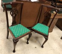 A set of four circa 1900 mahogany dining chairs in the Chippendale style together with two similar