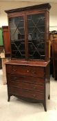 A 19th Century mahogany and satinwood strung secretaire bookcase,