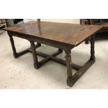A 19th Century French oak refectory style dining table,