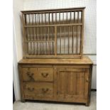 A Victorian pine dresser with two deep drawers and cupboard door 143 cm wide x 61 cm deep x 88.