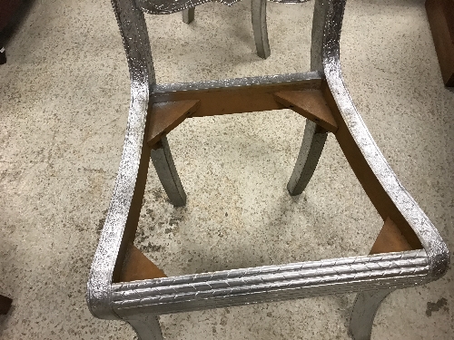 A pair of Continental embossed silver coloured metal covered bar back chairs with ram's head - Image 19 of 21