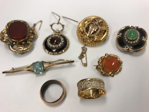 A collection of Victorian and other yellow metal brooches,