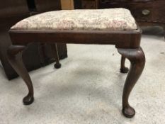 A circa 1900 walnut framed dressing stool in the early 18th Century manner,