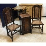 A pair of circa 1900 oak and caned hall chairs in the 17th Century manner together with a late