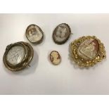 Four various gold / yellow metal mounted cameo brooches,
