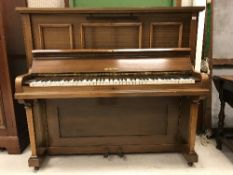 A mahogany cased upright piano, the straight strung wooden framed movement by Humphrey,