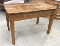 A circa 1900 pitch pine kitchen table,