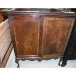 An early 19th Century mahogany press cupboard,